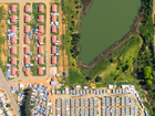 Aerial Image with a village next to a forest area