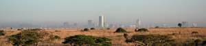 Header Nachhaltige Entwicklung in Afrika: Panorama Stadt und Land